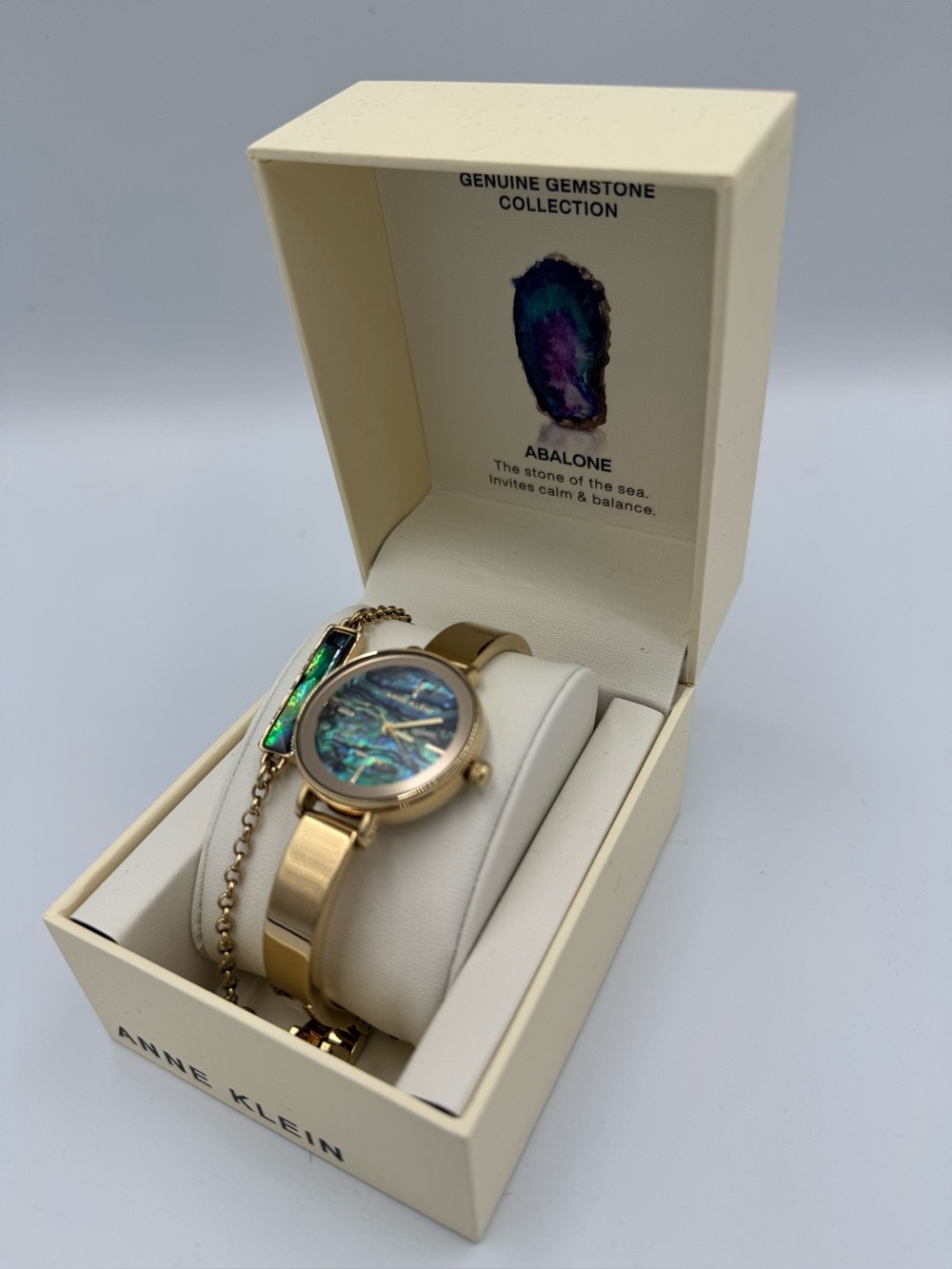 Anne Klein Gold-Tone Watch with Iridescent Abalone Dial and Bracelet Accent - Picture 6 of 9